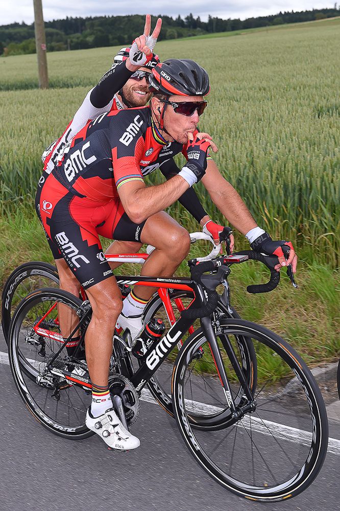 Philippe Gilbert and Danilo Wyss clown around during stage 4 at the Tour de Suisse