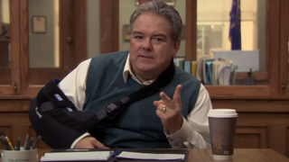 Jim O'Heir as Jerry with sling on and spilled coffee in Parks and Recreation 