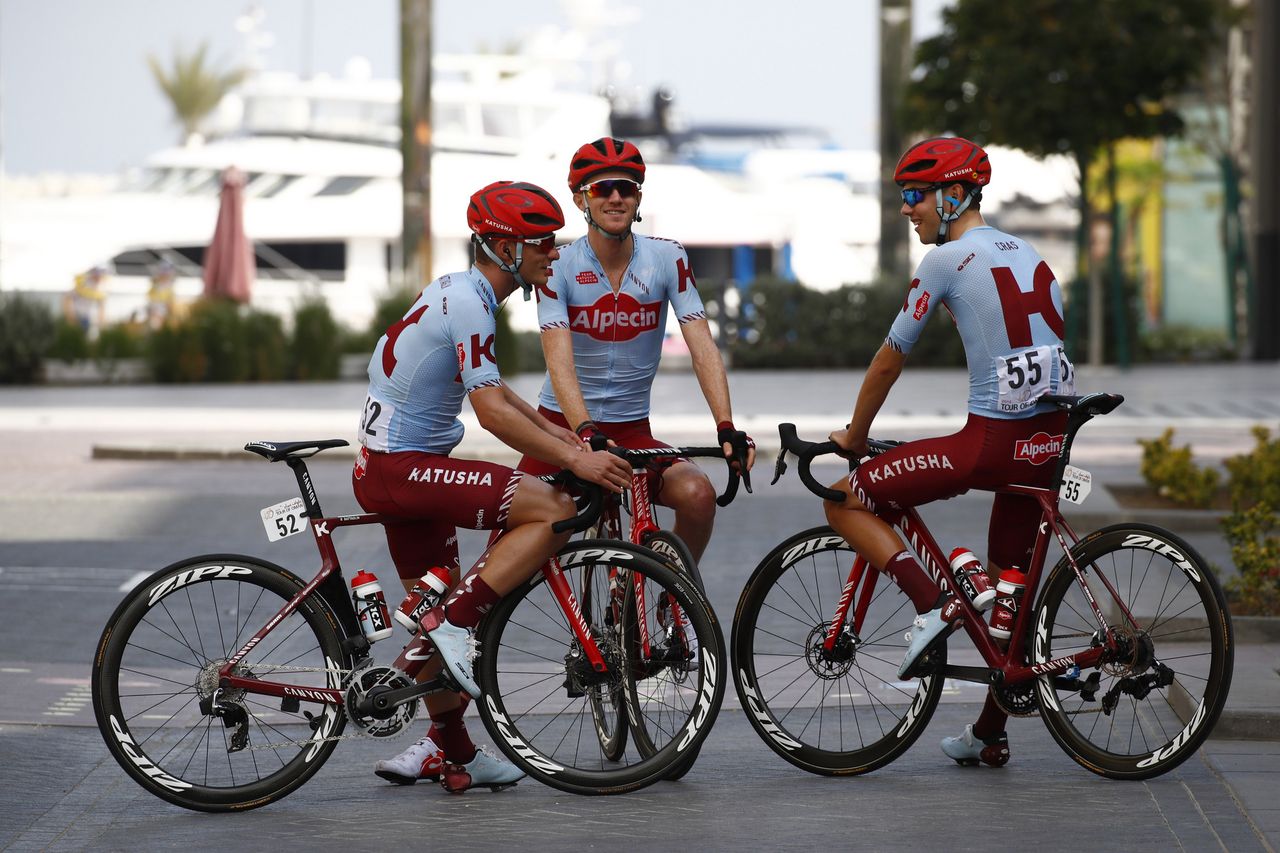 The Katusha-Alpecin riders enjoy a moment in the shade before the stage start