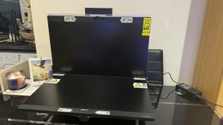 A Mobile Pixels Geminos monitor sitting on a desk