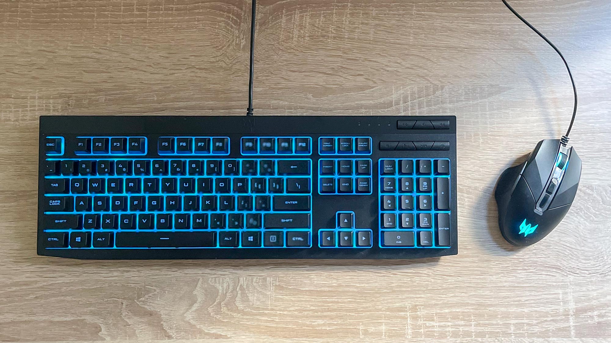 Acer Predator Orion 3000 keyboard and mouse on a desk