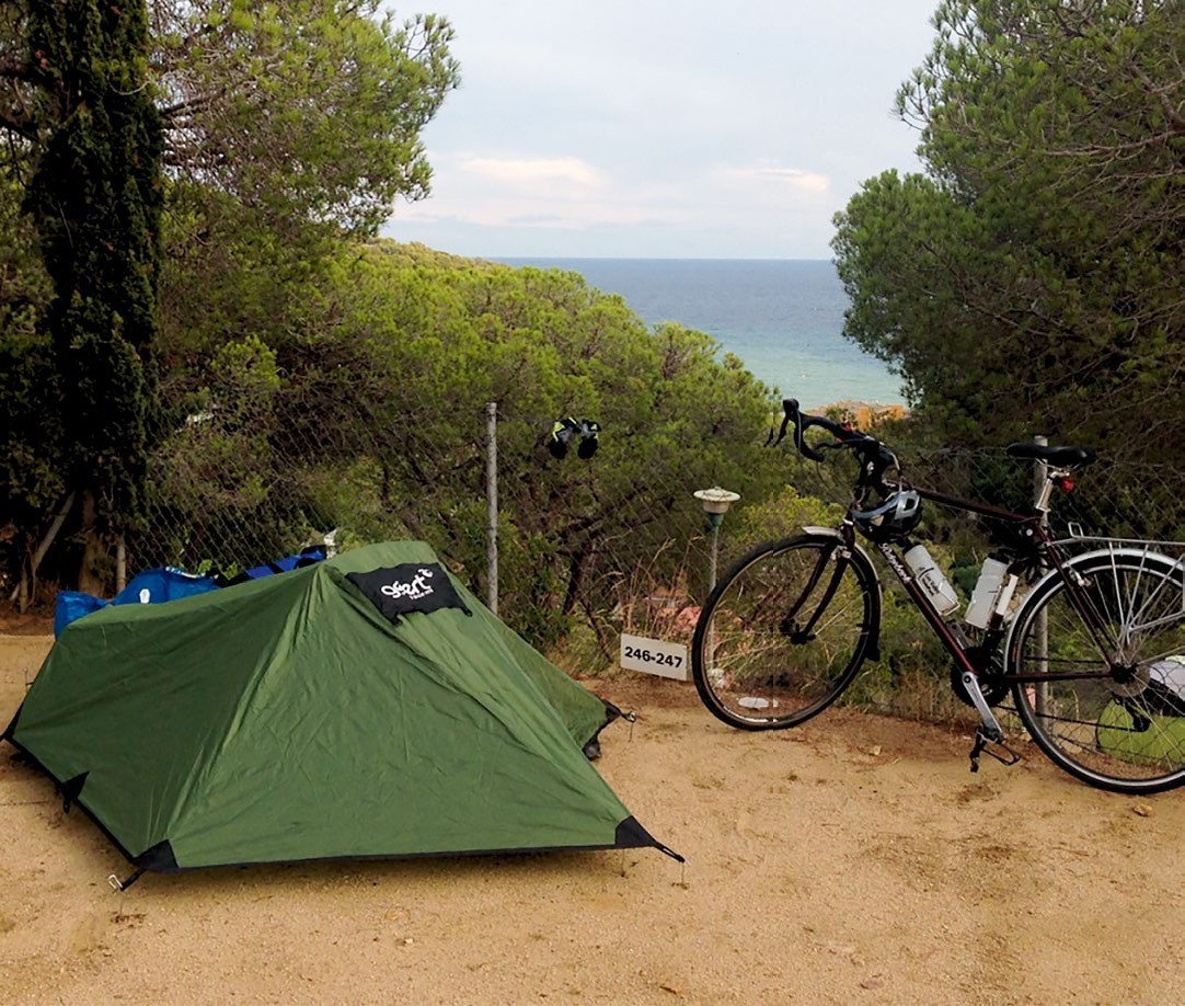 The writer's bike and tent pitched somewhere in France