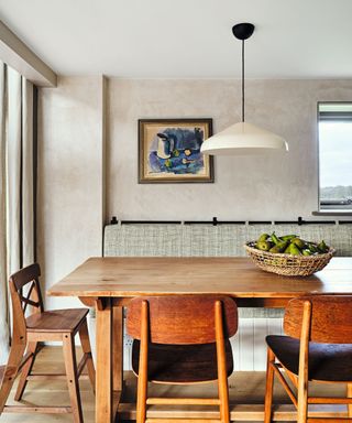 dining area with mid century astyle wooden furniture and inbuilt dining bench