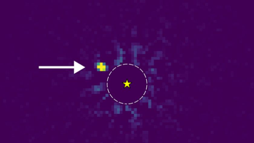 A heat map with a purple background and yellow dots showing an exoplanet