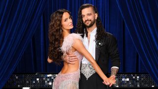 Maura Higgins and Mark Ballas posing or Dancing With the Stars Season 35.