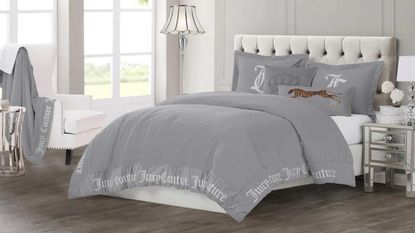 Juicy Couture bedding logo on bed grey 