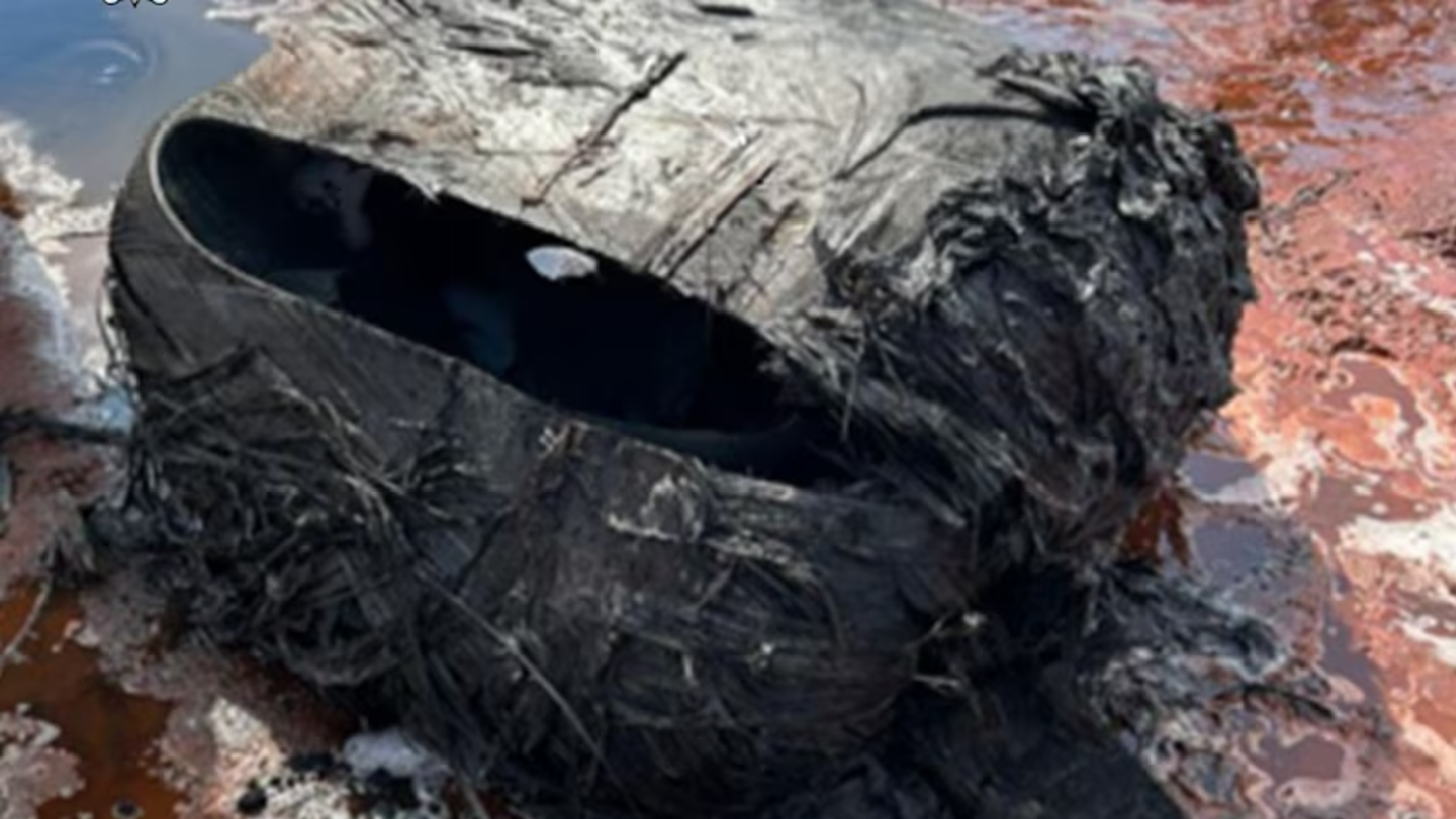 Close up of a burned metal wreckage