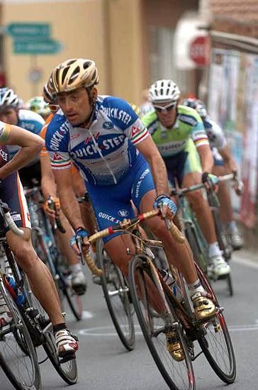 Paolo Bettini (Quick.Step) near the front of the peloton on the Cipressa