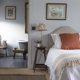 bedroom leading into ensuite in farmhouse