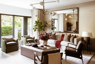 living room with geometric ceiling light pendant and clay lamp by Albion Nord