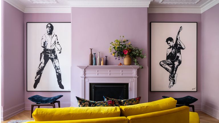 a purple living room with a yellow sofa 