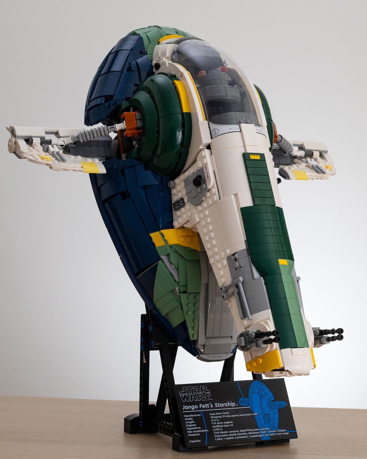 Lego Star Wars UCS Jango Fett&rsquo;s Firespray-Class Starship (75409) on a table with a white background 3/4 image