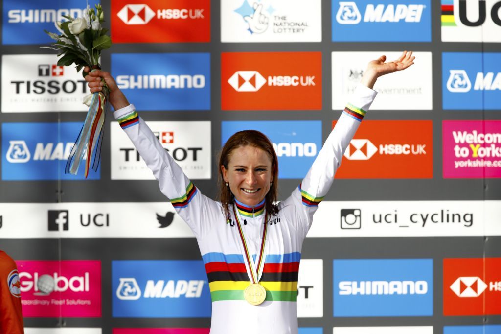 Annemiek van Vleuten, of the Netherlands, takes the rainbow jersey after winning the elite women’s road race at the 2020 UCI Road World Championships in Yorkshire