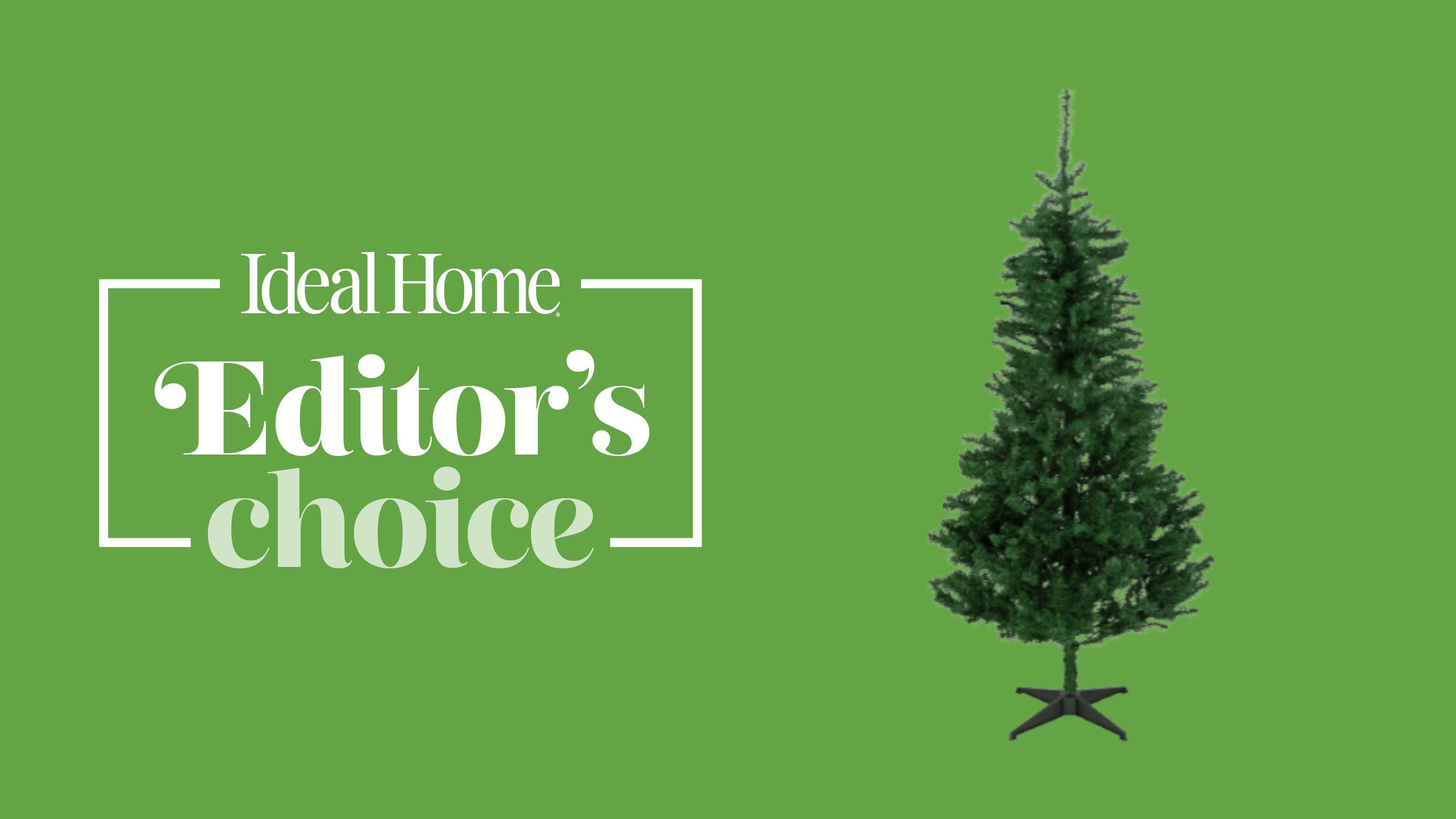 Artificial Christmas tree on green background