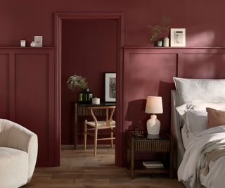 red bedroom with wall panelling