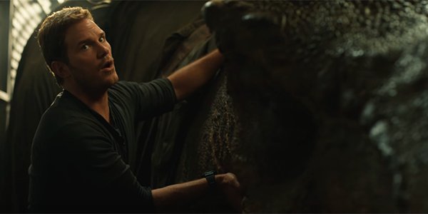 Owen Grady checking on a sleeping T-Rex in Jurassic World: Fallen Kingdom