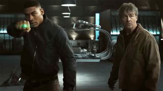 John Stewart powering up a Green Lantern ring next to Hal Jordan in Lanterns on HBO Max