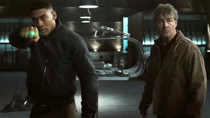 John Stewart powering up a Green Lantern ring next to Hal Jordan in Lanterns on HBO Max
