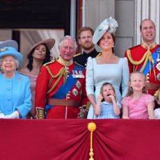Queen Elizabeth II, Meghan, Duchess of Sussex, Prince Charles, Prince of Wales, Prince Harry, Duke of Sussex, Catherine, Duchess of Cambridge, Prince William, Duke of Cambridge, Princess Charlotte of Cambridge, Savannah Phillips, Prince George of Cambridge and Isla Phillips stand on the balcony of Buckingham Palace during the Trooping the Colour parade on June 9, 2018