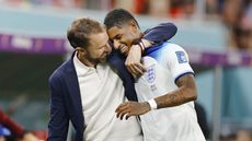 England boss Gareth Southgate congratulates Marcus Rashford  