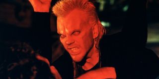 The Lost Boys Kiefer Sutherland showing his vampire face and strangling someone