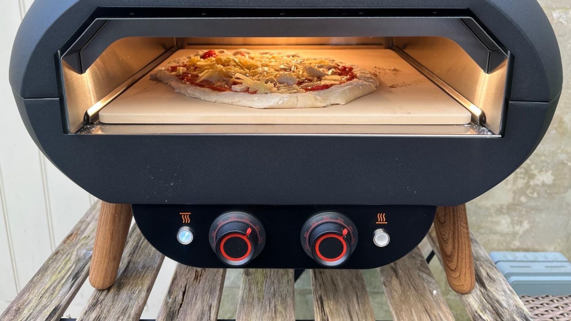The Firebloom EP03 Electric Pizza Oven being tested in a courtyard