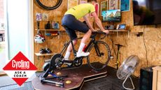 Male cyclist using an indoor cycling rocker plate