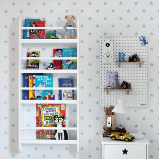 Childrens room with toys on display and stored on shelves and boxes