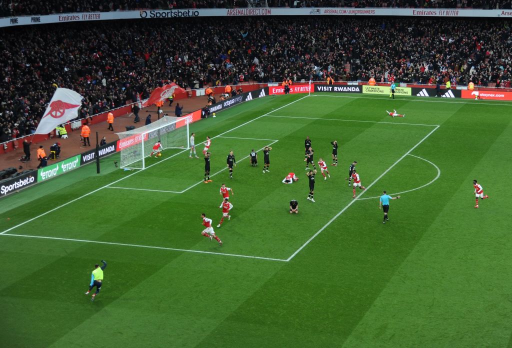 The Arsenal player and staff celebrate the 3rd goal, scored by Reiss Nelson during the Premier League match between Arsenal FC and AFC Bournemouth at Emirates Stadium on March 04, 2023 in London, England.