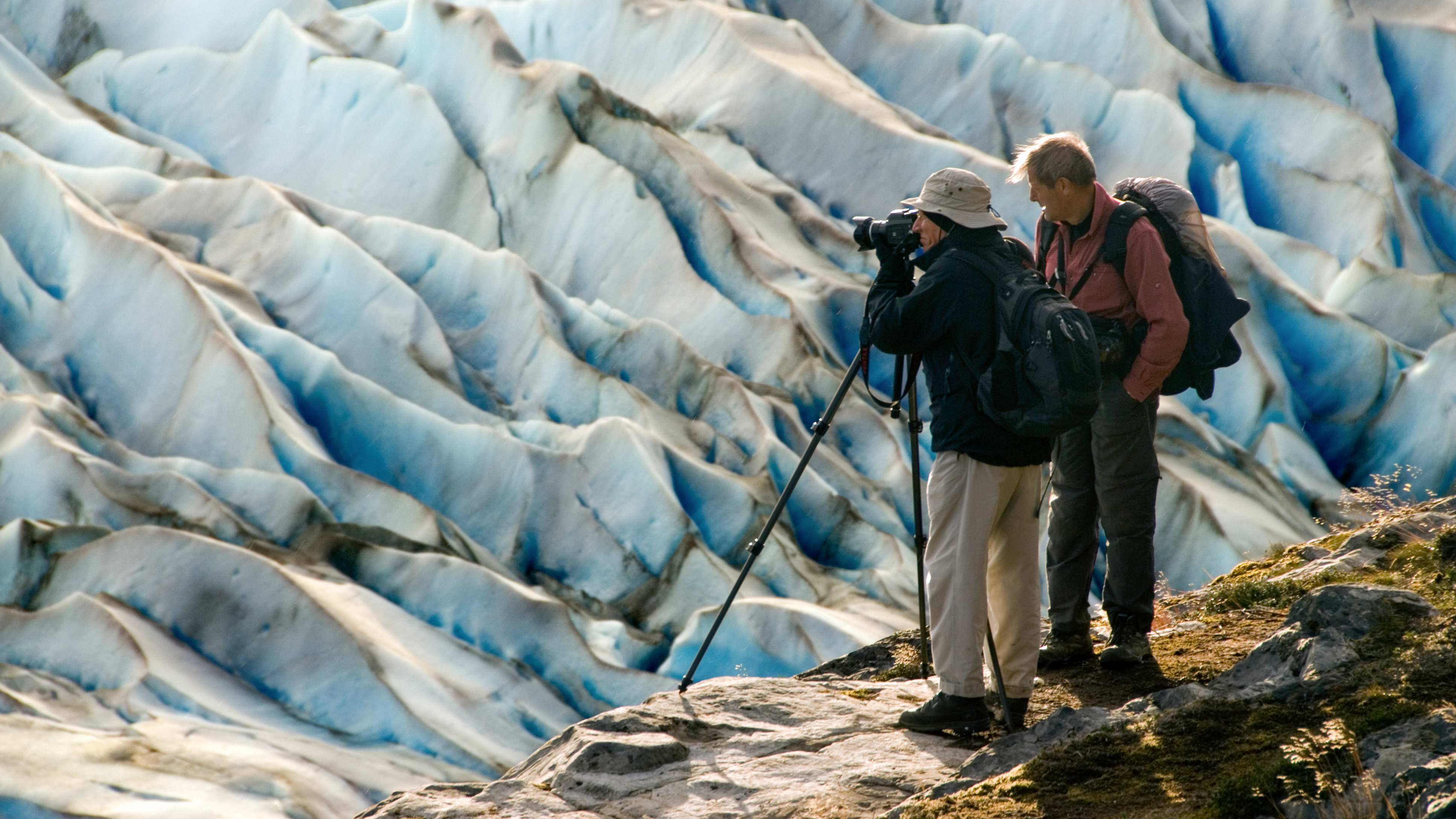 Photographer Sebastiao Salgado, and his assistant Jacques Barthelemy, photographing the Grey Glacier in Torres Del Paine National Park, Patagonia, Chile, 2007