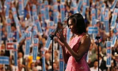 First Lady Michelle Obama addresses delegates at the Democratic National Convention in Charlotte, N.C., on Sept. 4: "Being president doesn't change who you are," she said. "It reveals who you