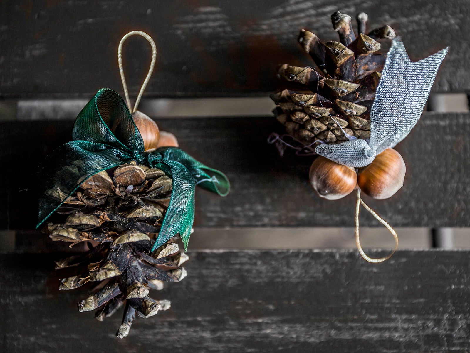 Christmas ornaments made form pine cone and hazelnut
