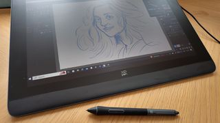 XPPen Artist Pro 16 (Gen 2) review; a stylus and drawing tablet on a table