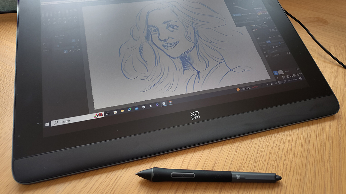 XP-Pen Artist Pro 16 (Gen 2) review; a stylus and drawing tablet on a table