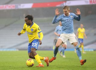 Percy Tau beating Oleksandr Zinchenko to the ball