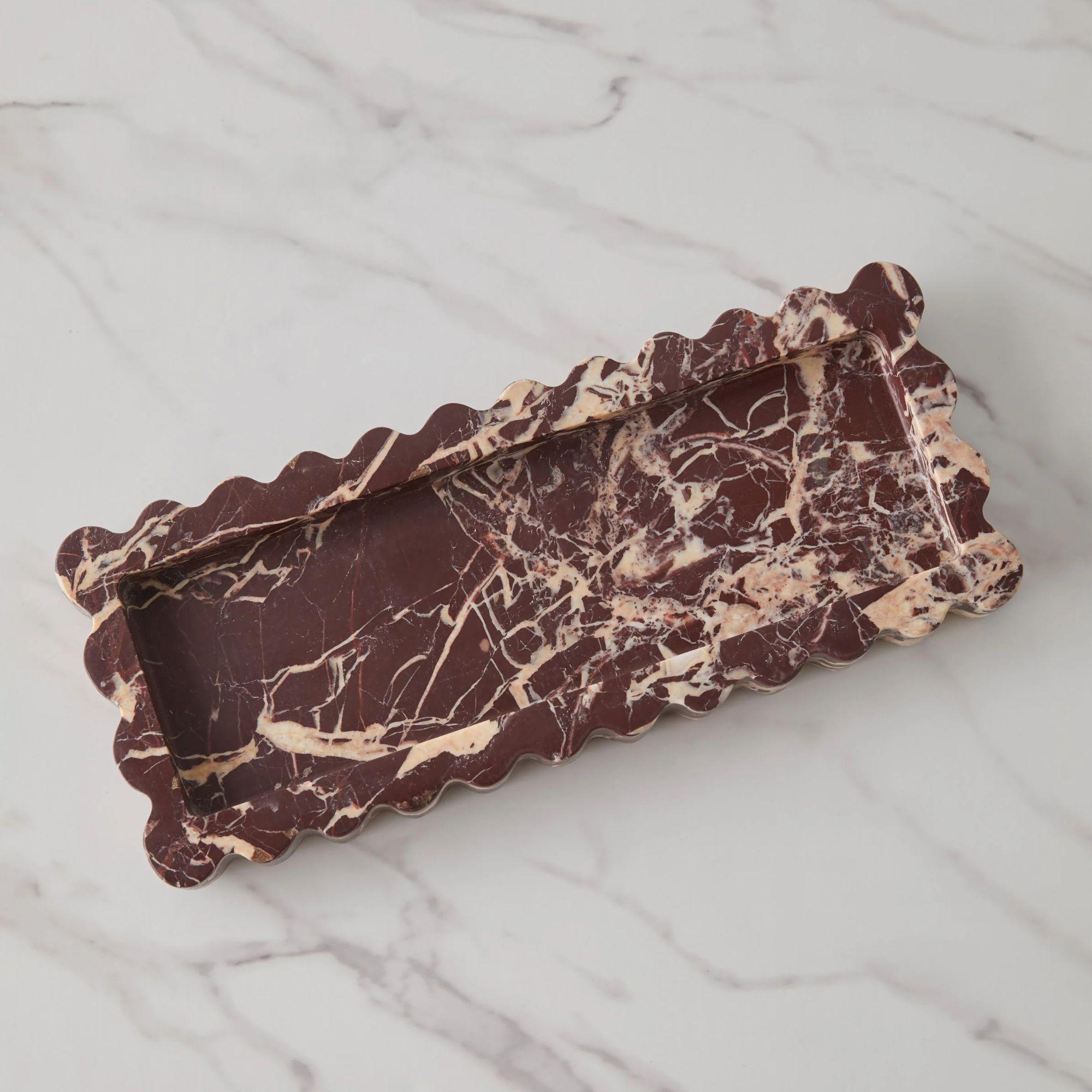 Burgundy marble tray with scalloped edges