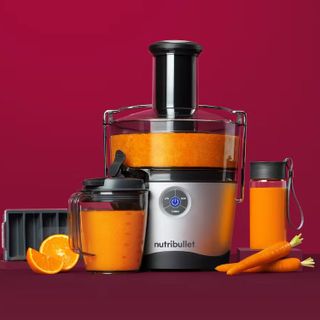 NutriBullet juicer on red background