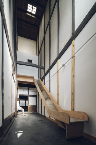 Internal slide at the Suzu apartment building renovation