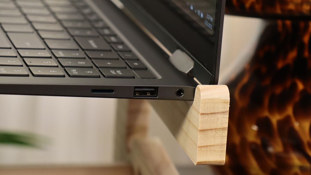 Samsung Galaxy Book3 on a wooden stand