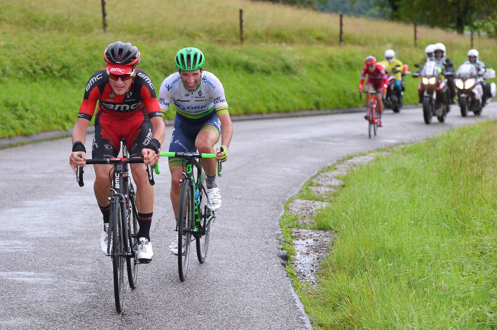 Silvan Dillier and Michael Albasini riding away