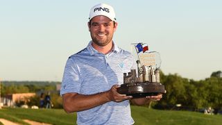 Corey Conners with the Valero Texas Open trophy