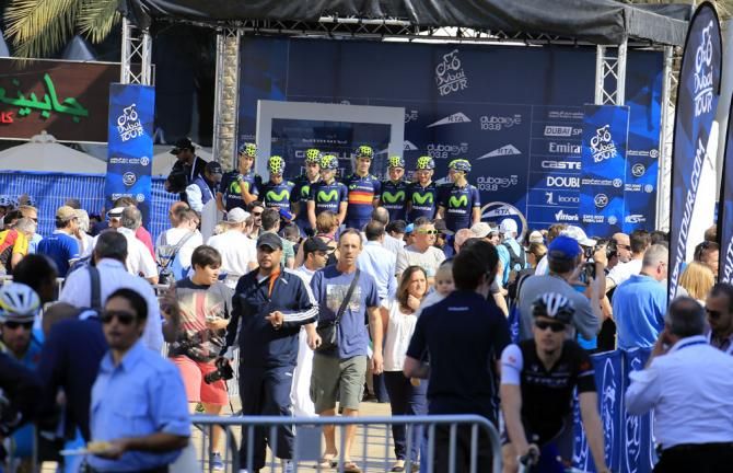 The Movistar team move onto the podium