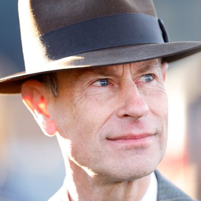 A headshot of Prince Edward wearing a gray hat