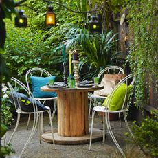 A tropical-style garden with seating