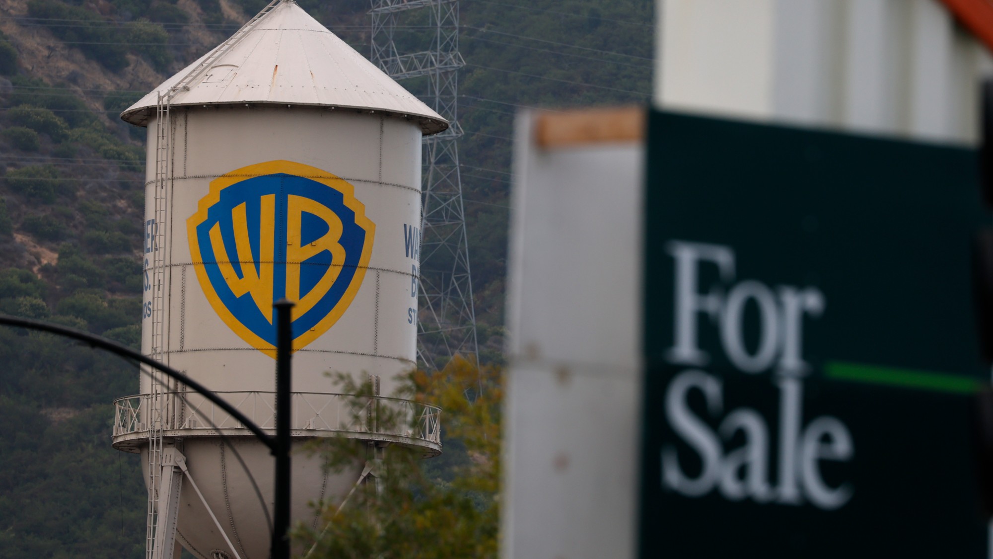The Warner Bros. logo is displayed on the water tower at Warner Bros. Studio on July 13, 2026 in Burbank, California. (Photo by Justin Sullivan/Getty Images)
