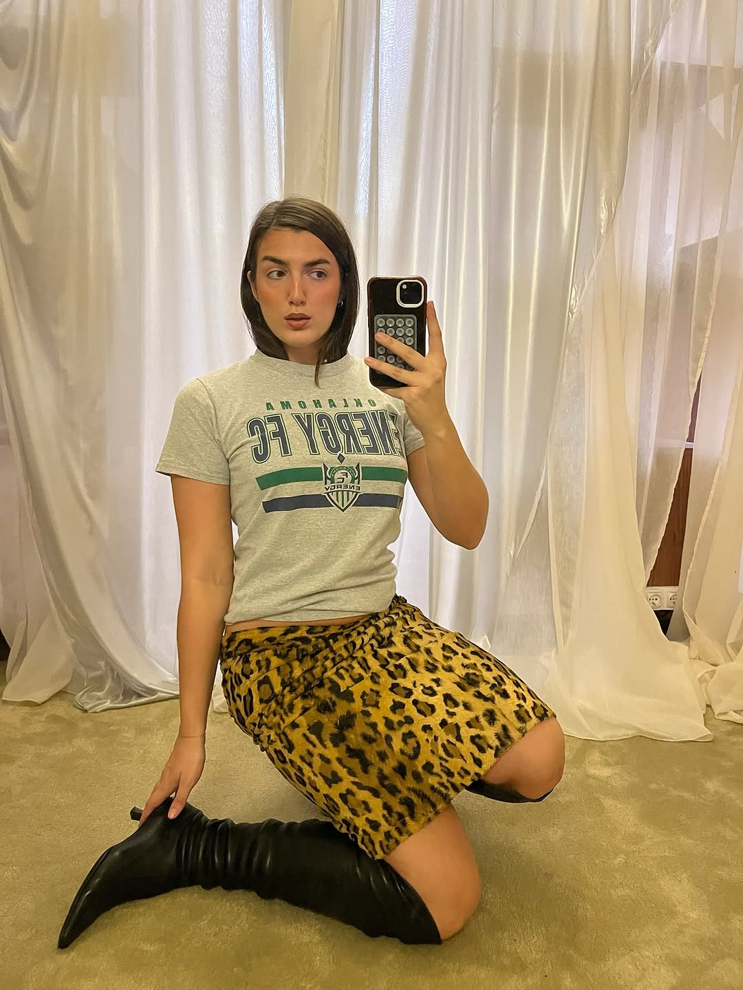 woman wearing over the knee boot outfit 2026