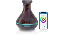 Maxcio Alexa WiFi Essential Oil Diffuser in wood effect, with smartphone app shown alongside