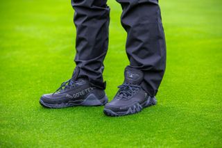 A close up of the adidas women's adicross GTX spikeless golf boots