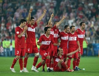 Turkey players celebrate after beating Croatia on penalties at Euro 2008.