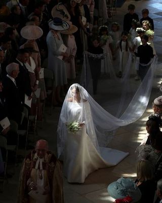 Bride, Wedding dress, Event, Bridal accessory, Gown, Dress, Ceremony, Veil, Bridal clothing, Bridal veil,